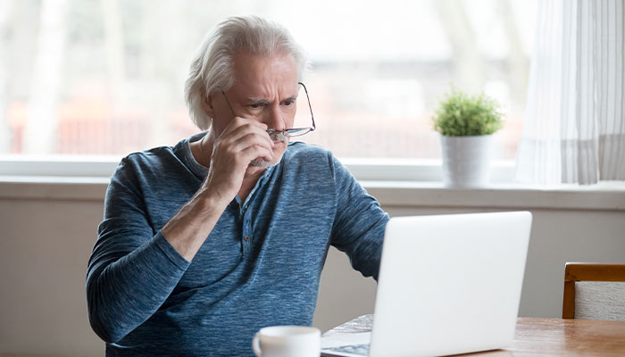 SC-Main-Consumer-Fraud700x400 Older gentleman looking concerned at his laptop screen