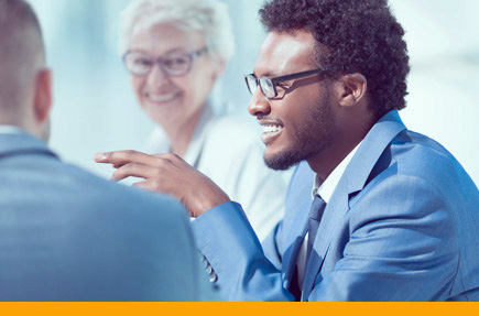 Picture of businessman smiling in meeting