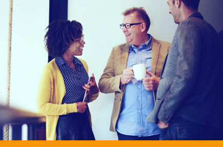 personal-loan0img Picture of three people talking and smiling