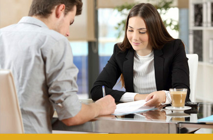 Picture of person signing document